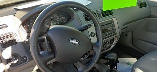 2005 Ford Focus S 1FAFP34N15W147919 in Rapid City, SD 5