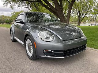 2014 Volkswagen Beetle  VIN: 3VWJP7AT3EM613135