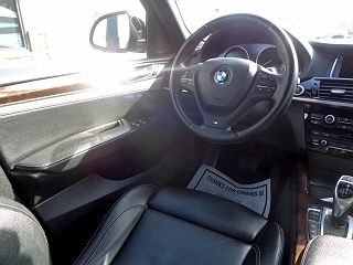 2015 BMW X4 xDrive28i 5UXXW3C51F0F89205 in Spencerport, NY 12