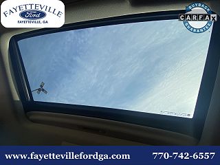 2015 Chevrolet Tahoe LTZ 1GNSKCKC6FR179166 in Fayetteville, GA 30