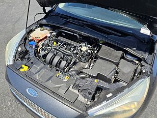 2016 Ford Focus SE 1FADP3F28GL341104 in Lillington, NC 16