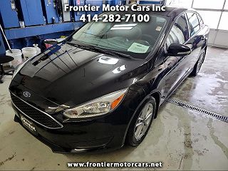 2016 Ford Focus SE 1FADP3F27GL288282 in Milwaukee, WI 1