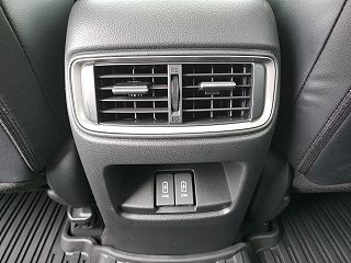 2018 Honda CR-V Touring 7FARW2H97JE011105 in Roscommon, MI 48