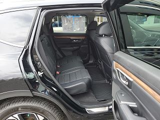 2018 Honda CR-V Touring 7FARW2H97JE011105 in Roscommon, MI 58