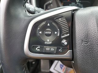 2018 Honda CR-V Touring 7FARW2H97JE011105 in Roscommon, MI 61