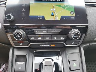 2018 Honda CR-V Touring 7FARW2H97JE011105 in Roscommon, MI 65
