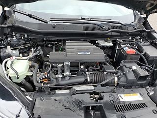 2018 Honda CR-V Touring 7FARW2H97JE011105 in Roscommon, MI 77