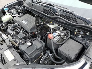 2018 Honda CR-V Touring 7FARW2H97JE011105 in Roscommon, MI 79